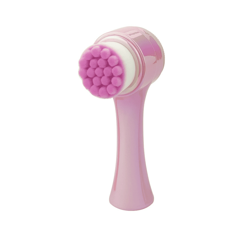 Pink facial cleansing brush with soft bristles.