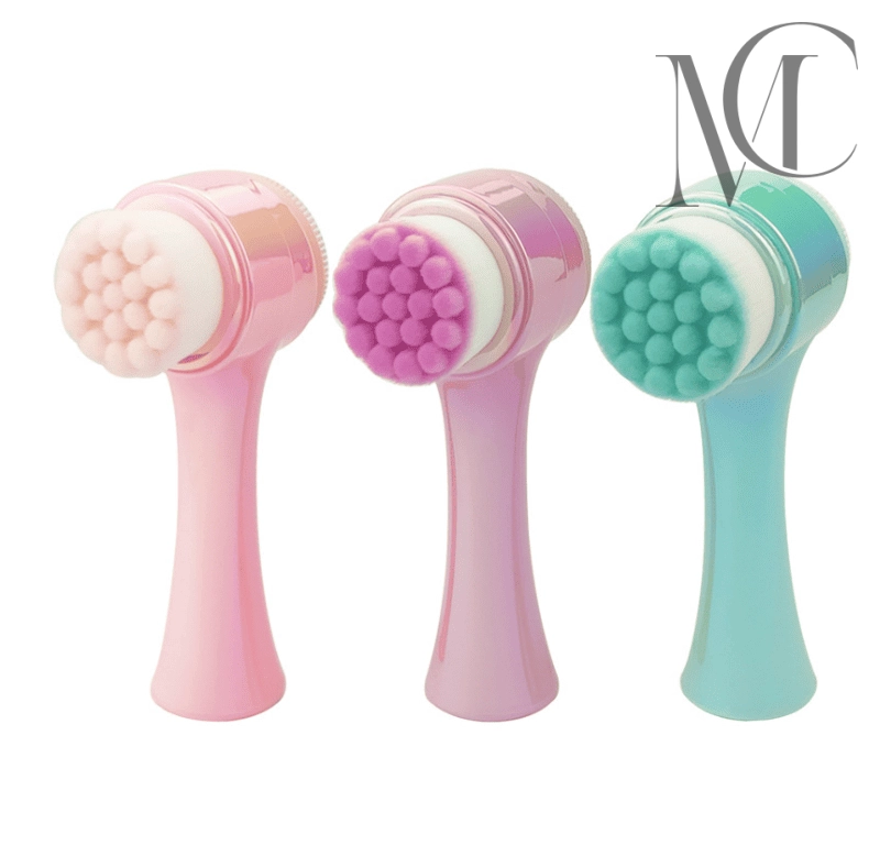 cosmetic brush cleaner Three pastel-colored facial cleansing brushes with soft bristles.