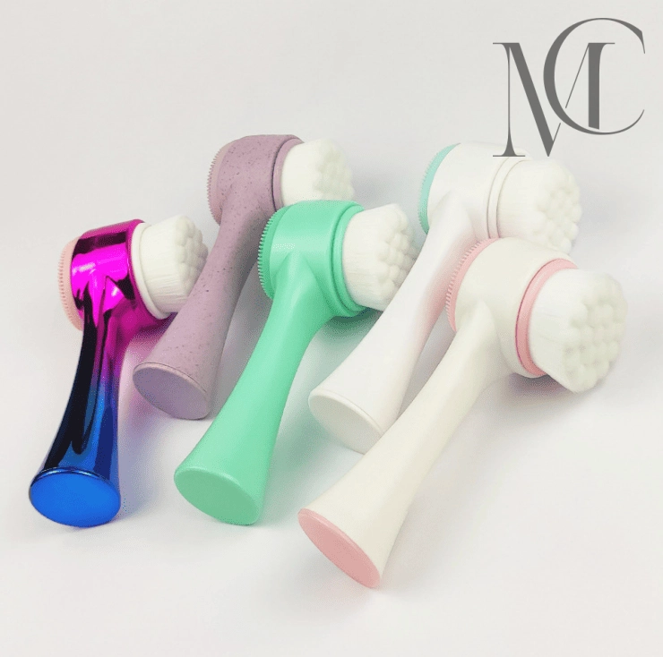 cleaning brush manufacturer Assorted colorful facial cleansing brushes on a white background.