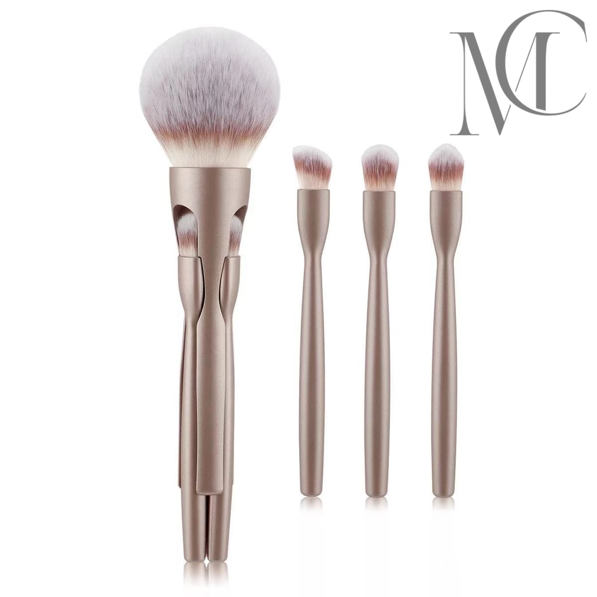 Magnetic travel brush Set of four gold-handled makeup brushes with white and brown bristles.