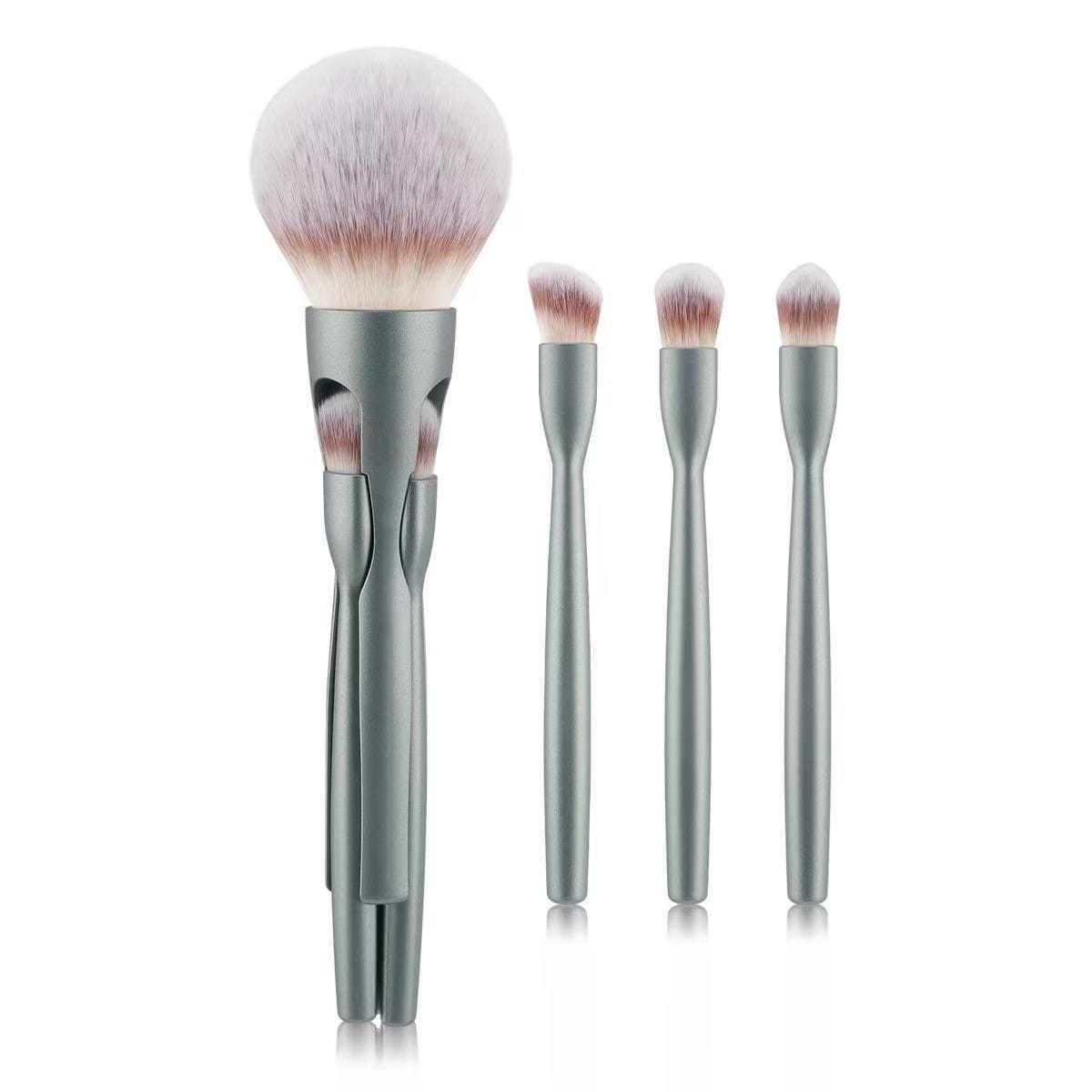 Silver makeup brush set with interchangeable brush heads.