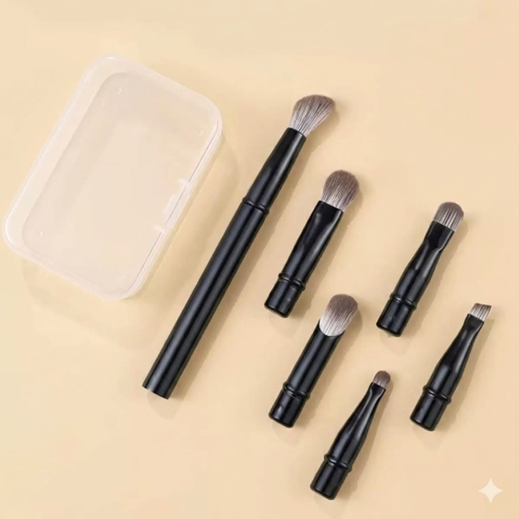 Makeup brush set with black handles and clear case.