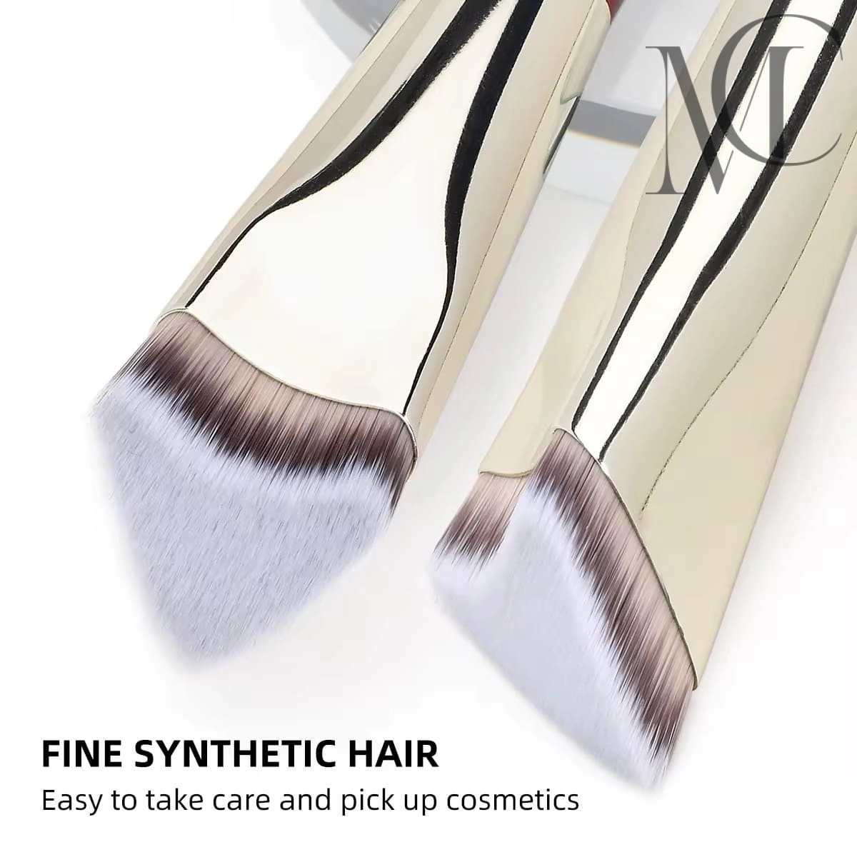 Angled Foundation Brush Two gold-handled makeup brushes with soft, angled synthetic bristles, one in focus.